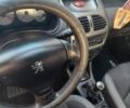 Белый Пежо 206, объемом двигателя 1.4 л и пробегом 292 тыс. км за 3381 $, фото 4 на Automoto.ua