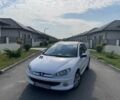 Белый Пежо 206, объемом двигателя 1.4 л и пробегом 298 тыс. км за 3600 $, фото 1 на Automoto.ua