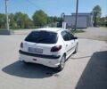 Белый Пежо 206, объемом двигателя 1.4 л и пробегом 220 тыс. км за 3650 $, фото 11 на Automoto.ua