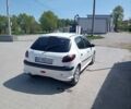 Белый Пежо 206, объемом двигателя 1.4 л и пробегом 220 тыс. км за 3650 $, фото 10 на Automoto.ua