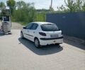 Белый Пежо 206, объемом двигателя 1.4 л и пробегом 220 тыс. км за 3650 $, фото 1 на Automoto.ua