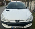 Белый Пежо 206, объемом двигателя 1.36 л и пробегом 227 тыс. км за 2500 $, фото 1 на Automoto.ua