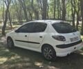 Белый Пежо 206, объемом двигателя 1.4 л и пробегом 235 тыс. км за 4100 $, фото 6 на Automoto.ua