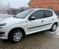Белый Пежо 206, объемом двигателя 1.6 л и пробегом 141 тыс. км за 5700 $, фото 1 на Automoto.ua
