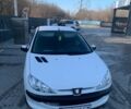 Белый Пежо 206, объемом двигателя 1.4 л и пробегом 169 тыс. км за 2999 $, фото 1 на Automoto.ua