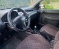 Белый Пежо 206, объемом двигателя 1.4 л и пробегом 231 тыс. км за 2500 $, фото 3 на Automoto.ua