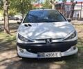 Белый Пежо 206, объемом двигателя 1.4 л и пробегом 235 тыс. км за 4100 $, фото 8 на Automoto.ua