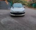 Білий Пежо 206, об'ємом двигуна 1.4 л та пробігом 230 тис. км за 2900 $, фото 1 на Automoto.ua