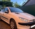 Белый Пежо 206, объемом двигателя 1.4 л и пробегом 209 тыс. км за 2800 $, фото 1 на Automoto.ua