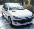 Белый Пежо 206, объемом двигателя 1.4 л и пробегом 235 тыс. км за 4100 $, фото 16 на Automoto.ua