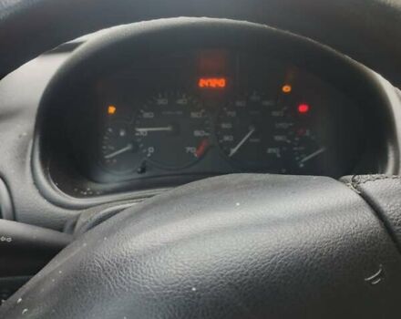 Белый Пежо 206, объемом двигателя 1.36 л и пробегом 248 тыс. км за 2700 $, фото 4 на Automoto.ua