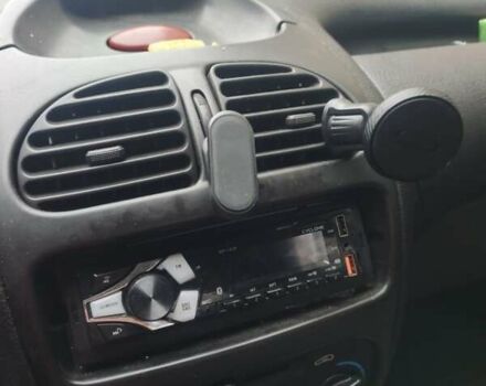 Белый Пежо 206, объемом двигателя 1.36 л и пробегом 248 тыс. км за 2700 $, фото 1 на Automoto.ua