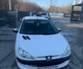 Белый Пежо 206, объемом двигателя 1.4 л и пробегом 169 тыс. км за 2999 $, фото 1 на Automoto.ua