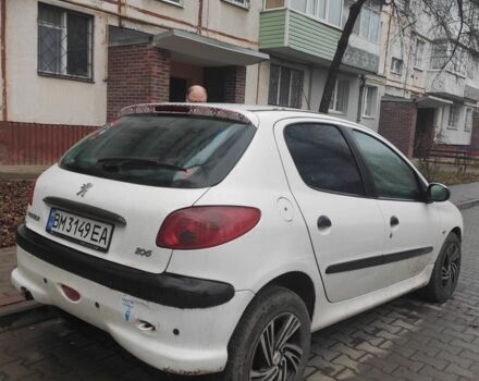 Белый Пежо 206, объемом двигателя 1.4 л и пробегом 201 тыс. км за 3700 $, фото 1 на Automoto.ua