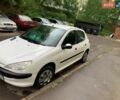 Белый Пежо 206, объемом двигателя 1.4 л и пробегом 400 тыс. км за 3000 $, фото 1 на Automoto.ua