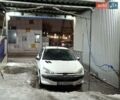 Белый Пежо 206, объемом двигателя 1.36 л и пробегом 227 тыс. км за 2890 $, фото 1 на Automoto.ua