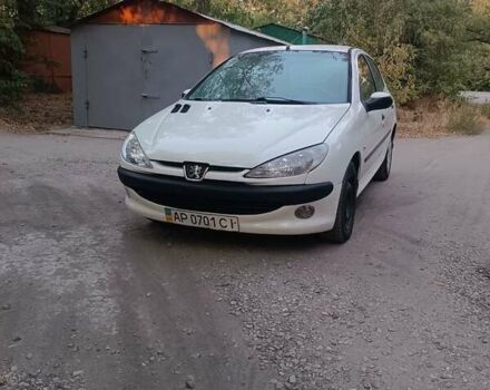 Білий Пежо 206, об'ємом двигуна 1.4 л та пробігом 230 тис. км за 2900 $, фото 1 на Automoto.ua