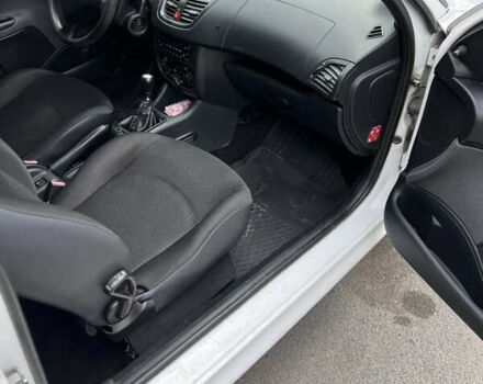 Білий Пежо 206, об'ємом двигуна 1.4 л та пробігом 250 тис. км за 3999 $, фото 6 на Automoto.ua