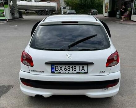 Білий Пежо 206, об'ємом двигуна 1.4 л та пробігом 195 тис. км за 3400 $, фото 9 на Automoto.ua