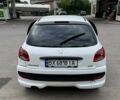 Білий Пежо 206, об'ємом двигуна 1.4 л та пробігом 195 тис. км за 3400 $, фото 9 на Automoto.ua
