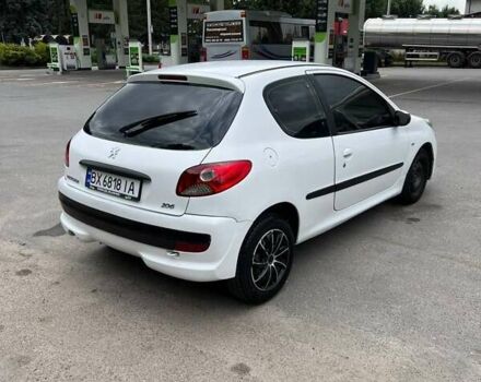 Білий Пежо 206, об'ємом двигуна 1.4 л та пробігом 195 тис. км за 3400 $, фото 8 на Automoto.ua