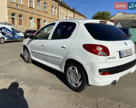 Білий Пежо 206, об'ємом двигуна 1.4 л та пробігом 213 тис. км за 4000 $, фото 24 на Automoto.ua