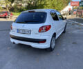 Білий Пежо 206, об'ємом двигуна 1.4 л та пробігом 213 тис. км за 4000 $, фото 4 на Automoto.ua
