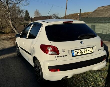 Белый Пежо 206, объемом двигателя 1.4 л и пробегом 152 тыс. км за 4700 $, фото 5 на Automoto.ua
