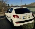 Белый Пежо 206, объемом двигателя 1.4 л и пробегом 152 тыс. км за 4700 $, фото 5 на Automoto.ua