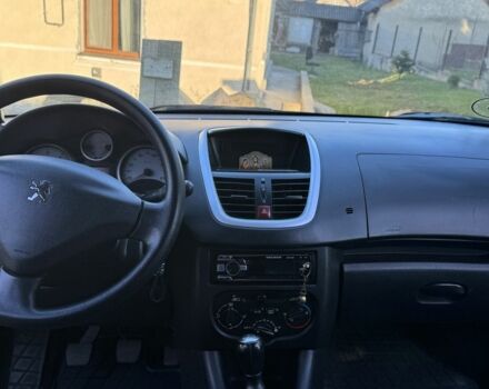 Белый Пежо 206, объемом двигателя 1.4 л и пробегом 152 тыс. км за 4700 $, фото 9 на Automoto.ua