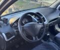 Белый Пежо 206, объемом двигателя 1.4 л и пробегом 152 тыс. км за 4700 $, фото 8 на Automoto.ua