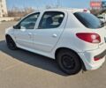 Белый Пежо 206, объемом двигателя 1.36 л и пробегом 140 тыс. км за 3899 $, фото 1 на Automoto.ua