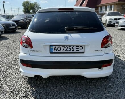 Белый Пежо 206, объемом двигателя 1.4 л и пробегом 175 тыс. км за 4950 $, фото 16 на Automoto.ua