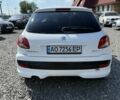 Белый Пежо 206, объемом двигателя 1.4 л и пробегом 175 тыс. км за 4950 $, фото 16 на Automoto.ua