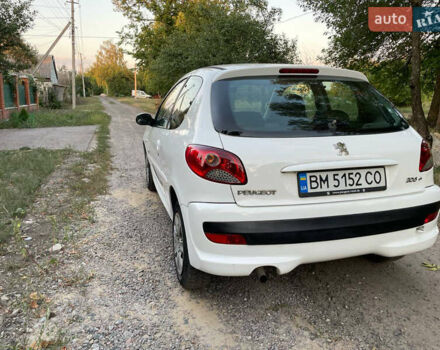 Белый Пежо 206, объемом двигателя 1.12 л и пробегом 180 тыс. км за 4500 $, фото 5 на Automoto.ua