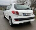 Белый Пежо 206, объемом двигателя 1.4 л и пробегом 130 тыс. км за 5800 $, фото 1 на Automoto.ua