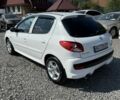 Белый Пежо 206, объемом двигателя 1.4 л и пробегом 175 тыс. км за 4950 $, фото 18 на Automoto.ua