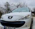 Белый Пежо 206, объемом двигателя 1.4 л и пробегом 130 тыс. км за 5800 $, фото 1 на Automoto.ua