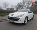Белый Пежо 206, объемом двигателя 1.4 л и пробегом 180 тыс. км за 4299 $, фото 1 на Automoto.ua