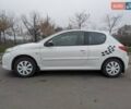 Белый Пежо 206, объемом двигателя 1.4 л и пробегом 176 тыс. км за 5200 $, фото 2 на Automoto.ua