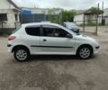 Білий Пежо 206, об'ємом двигуна 2 л та пробігом 255 тис. км за 3000 $, фото 3 на Automoto.ua