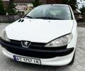Белый Пежо 206, объемом двигателя 1.1 л и пробегом 389 тыс. км за 1700 $, фото 1 на Automoto.ua