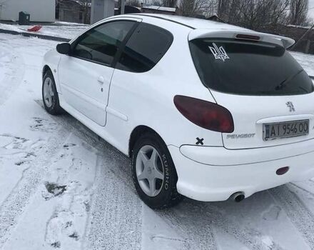 Білий Пежо 206, об'ємом двигуна 1.4 л та пробігом 300 тис. км за 3300 $, фото 3 на Automoto.ua