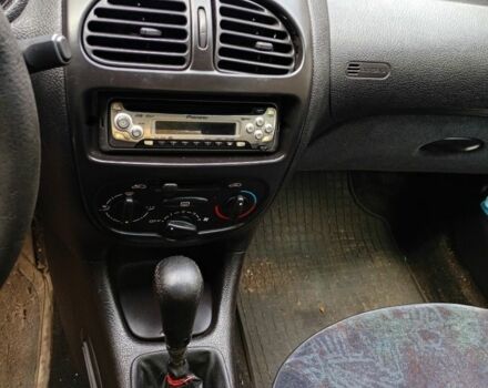 Белый Пежо 206, объемом двигателя 2 л и пробегом 360 тыс. км за 477 $, фото 10 на Automoto.ua