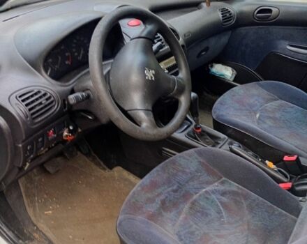 Белый Пежо 206, объемом двигателя 2 л и пробегом 360 тыс. км за 597 $, фото 9 на Automoto.ua