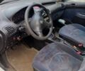 Белый Пежо 206, объемом двигателя 2 л и пробегом 360 тыс. км за 477 $, фото 9 на Automoto.ua