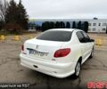 Білий Пежо 206, об'ємом двигуна 1.4 л та пробігом 229 тис. км за 2850 $, фото 2 на Automoto.ua