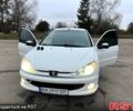 Білий Пежо 206, об'ємом двигуна 1.4 л та пробігом 229 тис. км за 2850 $, фото 11 на Automoto.ua