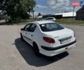 Білий Пежо 206, об'ємом двигуна 1.36 л та пробігом 221 тис. км за 1999 $, фото 8 на Automoto.ua
