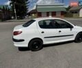 Білий Пежо 206, об'ємом двигуна 1.36 л та пробігом 221 тис. км за 1999 $, фото 10 на Automoto.ua